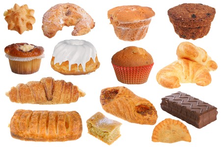 Assembling of delicious pastries and cakes isolated on white backgroundの写真素材