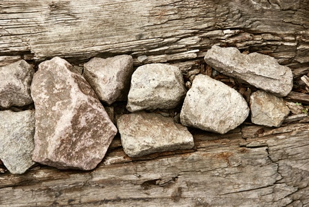 Close-up of old wood and rocks backgroundの写真素材