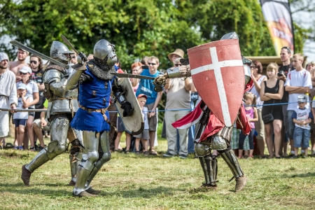 LIW, POLAND 17 AUGUST: Members of Medieval Reinactment Order fight in Liw Tournament on 17 August 2013 in Liw, Polandのeditorial素材
