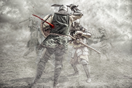 Medieval knights fighting in a battleの写真素材