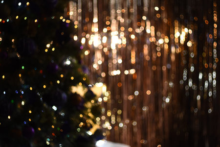 christmas background bokeh blurred of fir and golden linesの写真素材