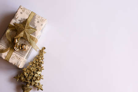 New Years composition. Christmas gift, pine, on a white background.の写真素材