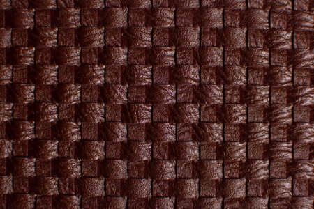 Dark brown vintage fabric with woven texture closeup. Textile background macro. A big step.の写真素材