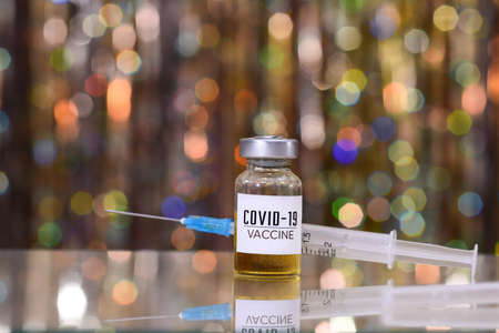 Coronavirus vaccine and syringe injection. Treatment from corona virus infection.の写真素材