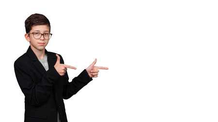 Boy teen point his hands to empty place with copy space. Isolated on white background