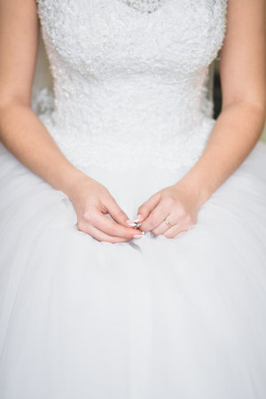 A bride in a wedding dress. Close-up.の写真素材
