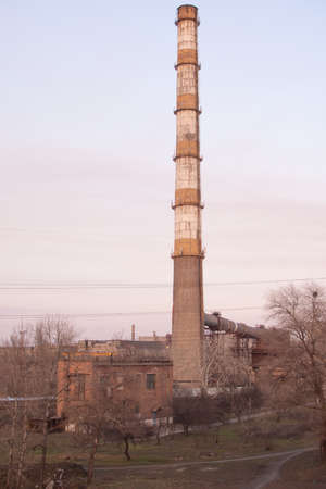 The chimney of the enterprise. Vertical photo.の写真素材