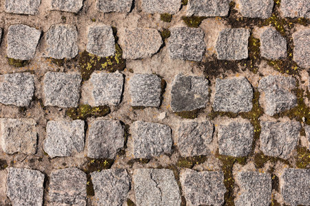 Stone road texture. Background stone arrangement in pattern.