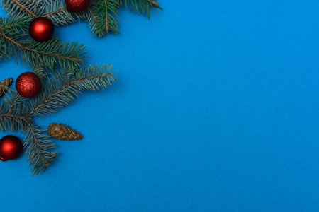 top view. new Years layout on a blue background. spruce branches. mock up