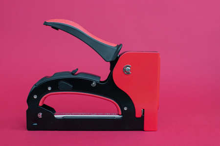Furniture stapler steel repair tool. Stapler gun.の写真素材