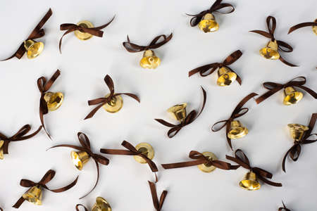 Layout background of bells with ribbon bows.の写真素材