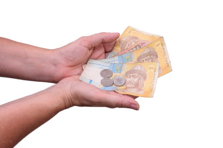 UAH hryvnia, paper banknotes and metal coins. isolated on a white background.