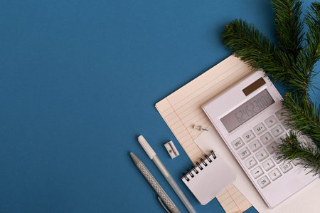 Business New Years layout on a blue background. Top view, copy space