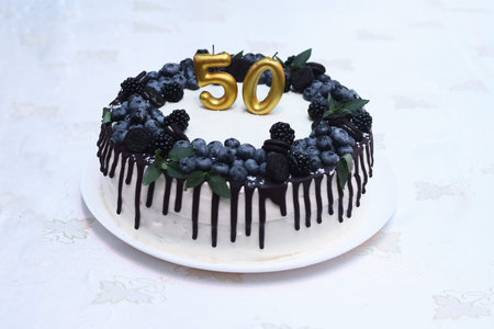Birthday cake with fresh berries - Number fifty 50.