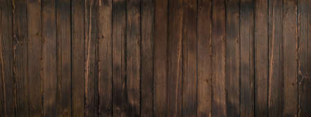 the wall is made of brown boards. copy spaceの写真素材