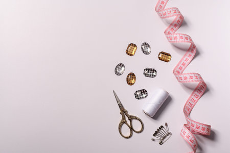 copy space. layout of tools for sewing on white background.