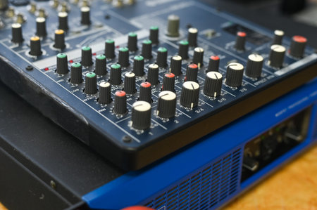 Contemporary mixing board, combining technology and creativity for music production. audio mixing is...
