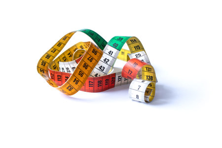 Multicolour tape measure. Empty copy space.