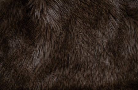 Dark artificial fur textile material.