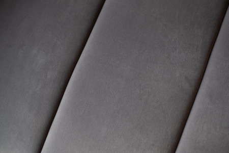 Gray colored velvet background. Soft fabric furniture backdrop.の写真素材