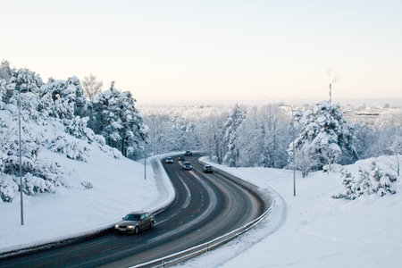 Cars driving on a snowy road