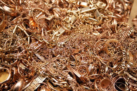 Pile of old used gold jewelry.の写真素材