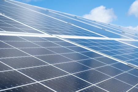 Solar panels. Alternative renewable green energy. Close-up of solar panels and blue sky