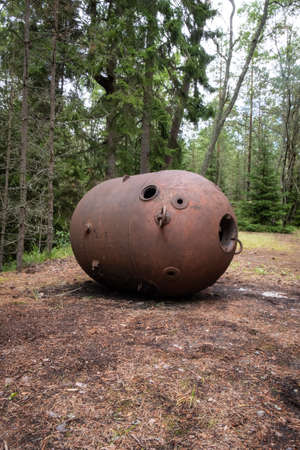 Old soviet underwater naval mines casings scattered in the forest of Naissaar island, Estoniaの写真素材