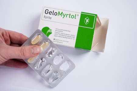 Tallinn, Estonia - 02.08.2022: GeloMyrtol forte capsules by Pohl-Boskamp for chronic bronchitis and acute sinusitis treatment. Mixture of eucalyptus, sweet orange, myrtle and lemon essential oils.のeditorial素材