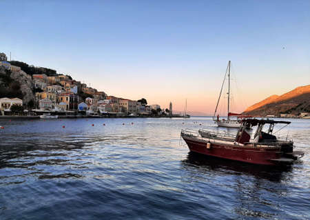 Small boats in the harbor of Symi island, Greece.の写真素材