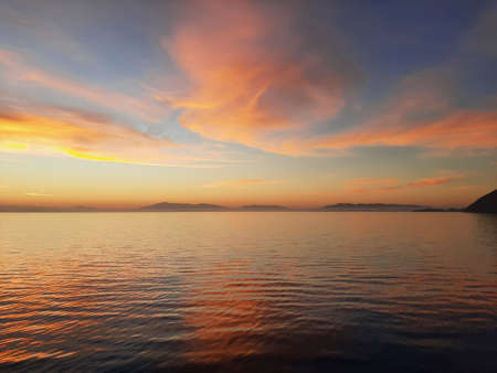 Morning sunrise on the horizon of the Aegean sea.の写真素材