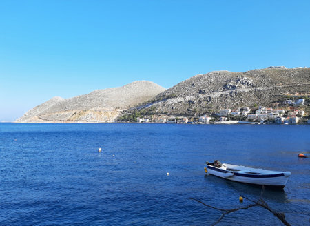 Small boat in the harbor of Symi island, Greece.の写真素材