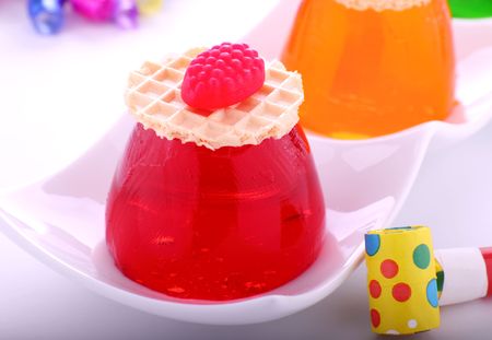 Strawberry and orange jellies at a kids party.の写真素材
