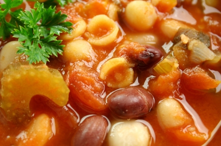 Close up of delicious freshly made Italian minestrone soup with parsley.の写真素材
