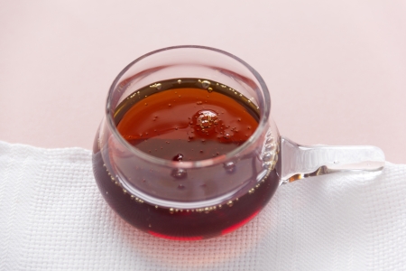 Bowl of delicious thick maple syrup ready for serving as a condiment.の写真素材