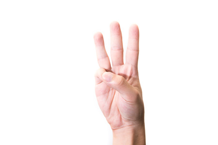 Male hand is showing three fingers isolated on white backgroundの写真素材