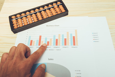 Hand and abacusの写真素材