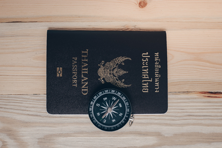 Thailand passport on the wooden tableの写真素材