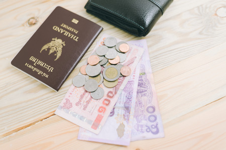 Thailand passport and Thai moneyの写真素材