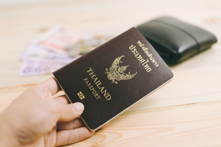 Thailand passport and Thai moneyの写真素材