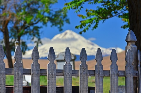 Abstract of an old weathered picket fence surrounding an 1800の写真素材