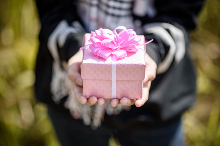 gift box in girl handsの写真素材