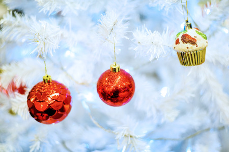 White Christmas Tree with Red Baublesの写真素材
