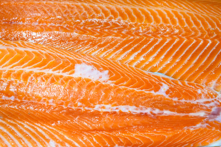 Close up of a salmon fillet , background and texture