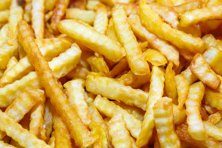 Close up Yellow French Fries Backgroundの写真素材