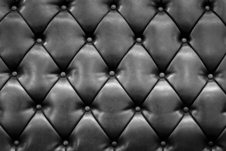 luxury buttoned black leather backgroundの写真素材