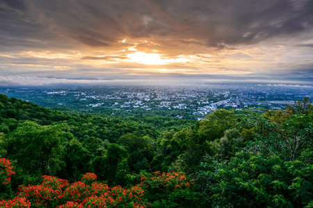 The Aerial Pan View of Chiang Mai City in cloudy day at sunrise, Thailand