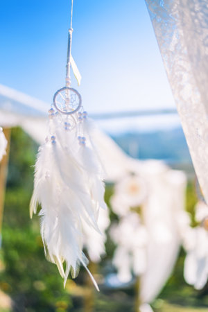 White Dreamcatcher in blue sky, american native amuletの写真素材