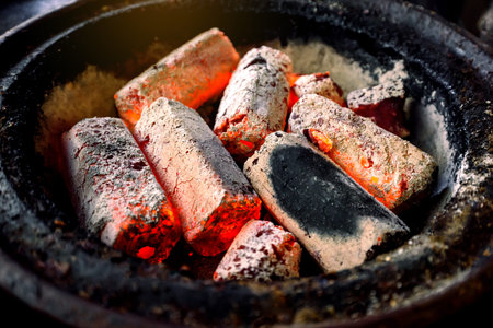 red hot charcoal in stove for gilling