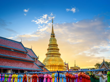 colorful lanterns in Loi Krathong or Yi Peng Festival in Wat Phra That Hariphunchai Temple at nightの写真素材